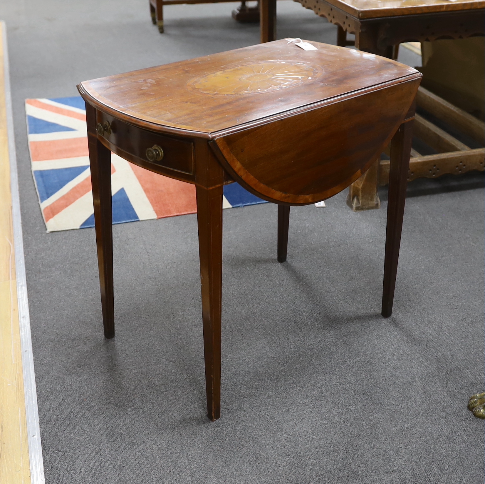 A George III banded mahogany and marquetry inlaid oval Pembroke table, width 75cm, depth 46cm, height 69cm